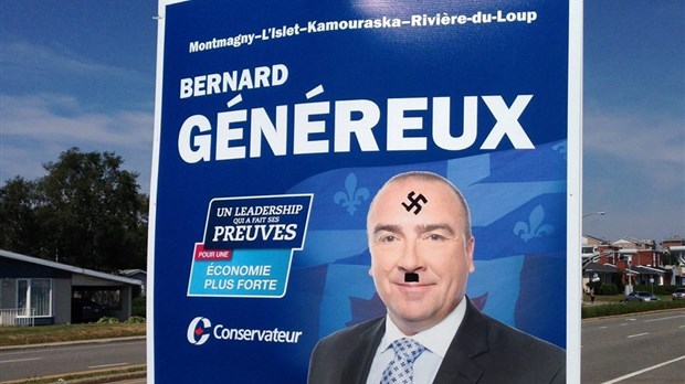 Croix gammée nazie sur une pancarte du candidat conservateur Bernard Généreux